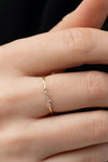 Close-up view of 1.15mm thick Love Diamond Ring with G color VS clarity diamonds